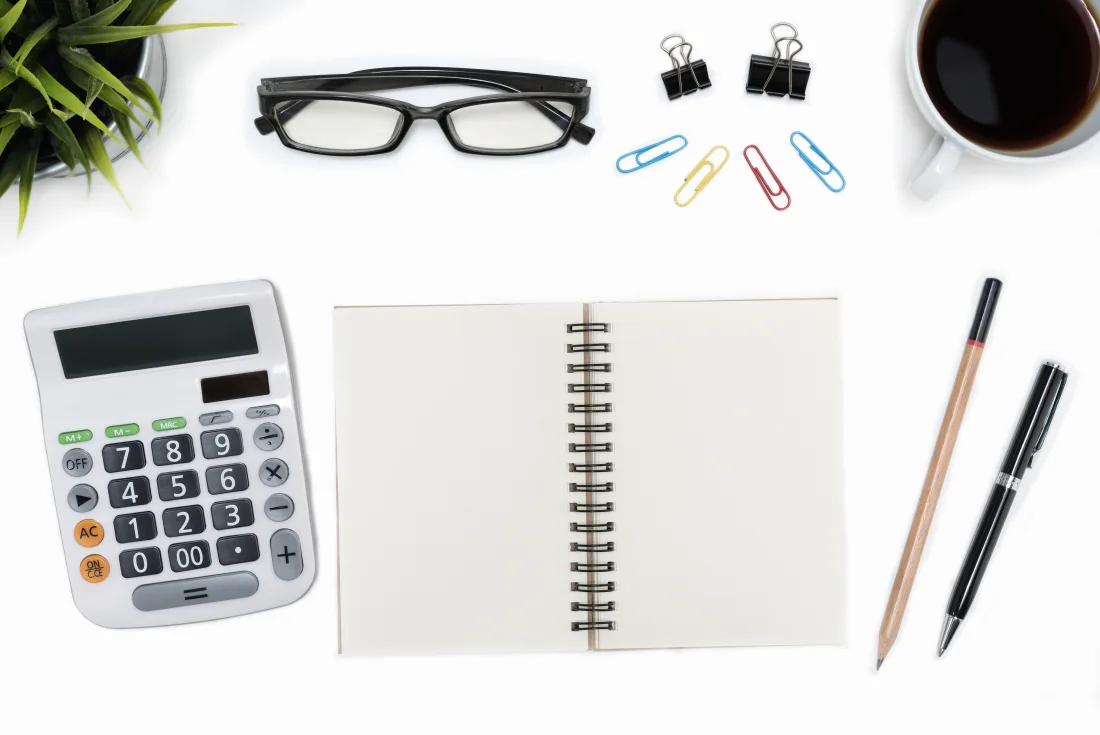 Calculator and training invoice used to plan pilot and AME training costs in Pakistan