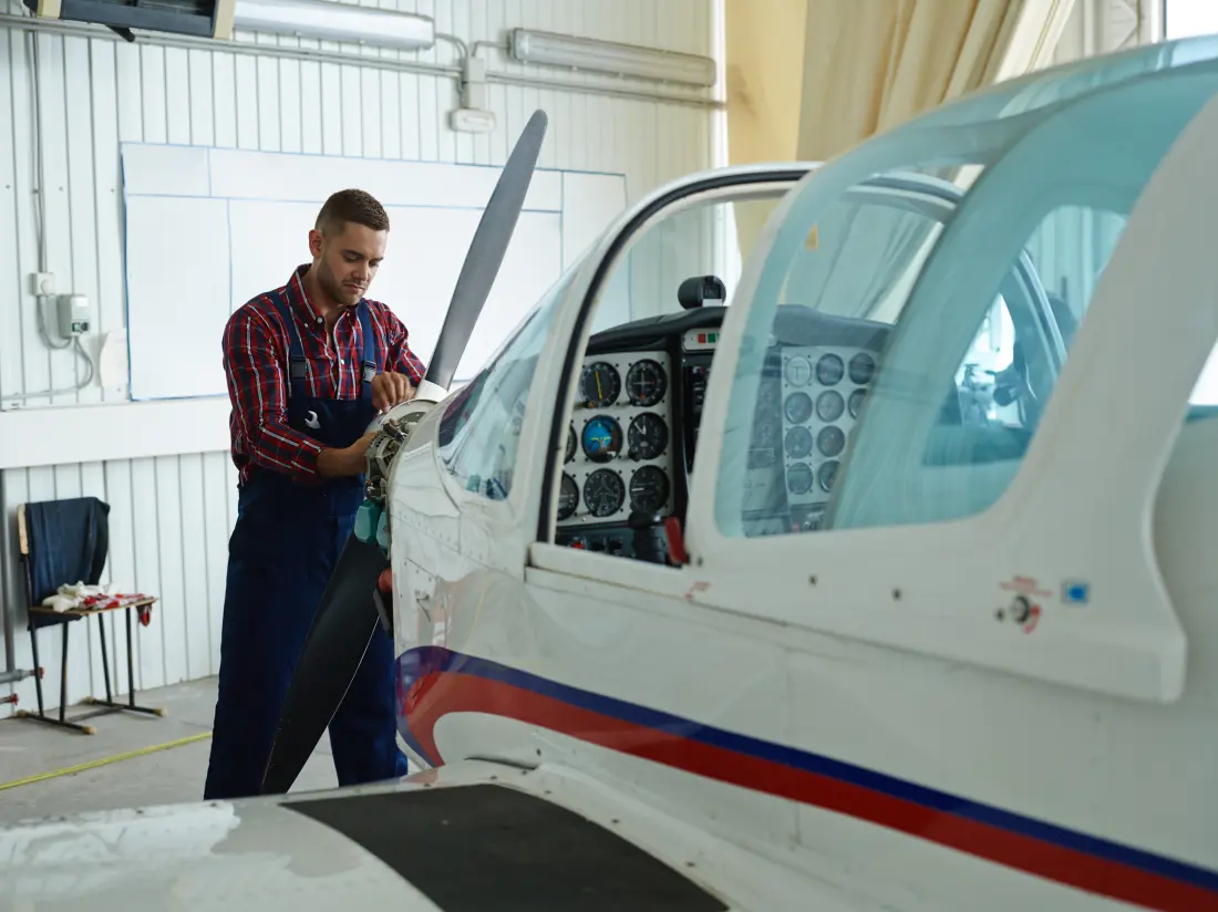 Aircraft maintenance engineers repairing an aircraft, showing the skills needed for the job