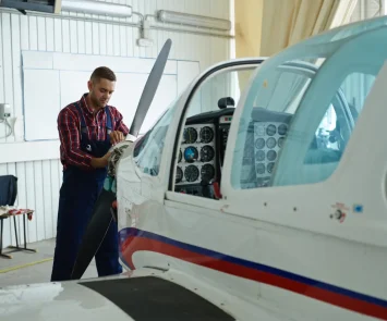 Aircraft maintenance engineers repairing an aircraft, showing the skills needed for the job